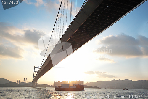 Image of long bridge in sunset hour