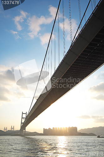 Image of long bridge in sunset hour