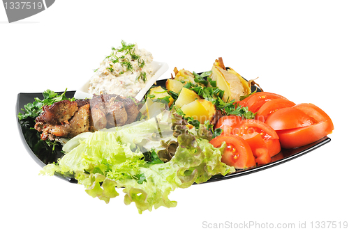 Image of Grilled meat and potatoes