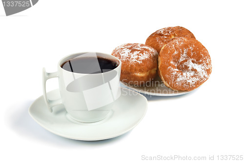 Image of A cup of coffee and saucer with donuts