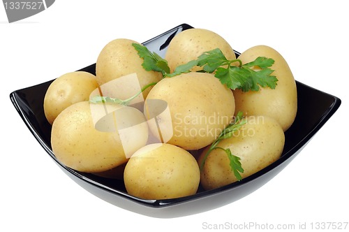 Image of Dish with boiled potatoes in their skins