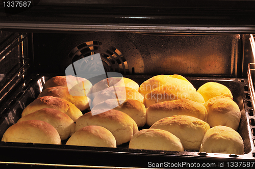 Image of Buns on a baking sheet in oven