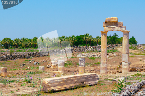 Image of Ancient columns and arch.