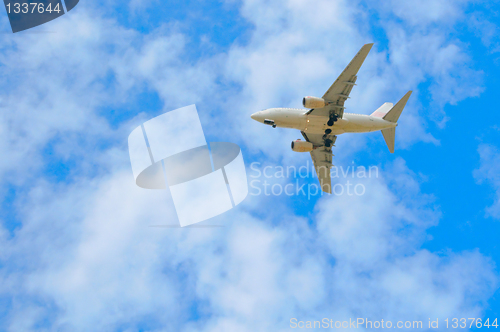 Image of Passenger plane in the blue sky