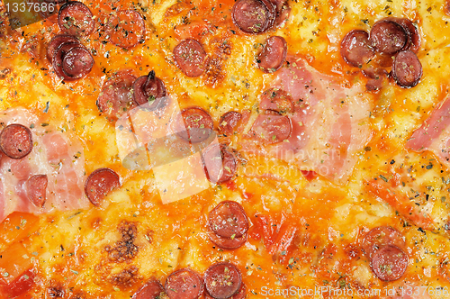 Image of Pizza with  sausage  and bacon, background