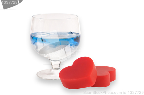 Image of A two glasses of liqueur with two hearts.