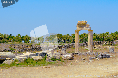 Image of Ancient columns and arch.