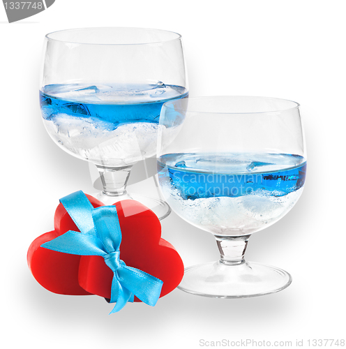 Image of A two glasses of liqueur with two hearts.