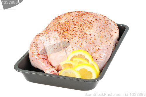 Image of Stuffed chicken  on a baking sheet