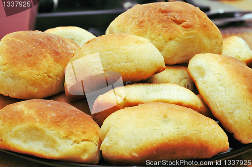 Image of Buns on a baking sheet in oven