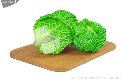 Image of Savoy cabbage on a wooden board