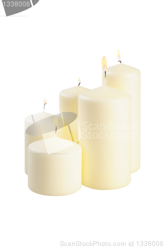 Image of Five large lighted candle