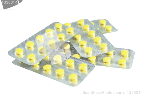 Image of Several packs of yellow pills