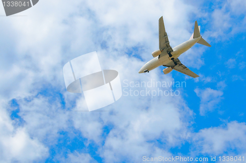 Image of Passenger plane in the blue sky