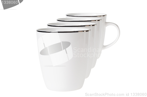 Image of Four empty cup standing in line