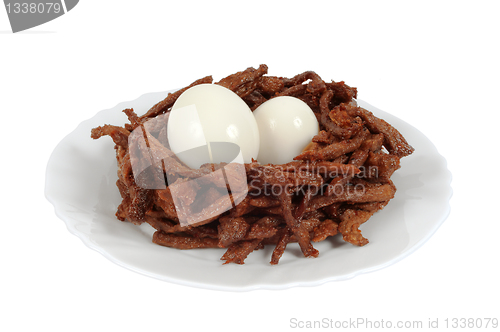 Image of Meat sticks decorated in the form of bird nest