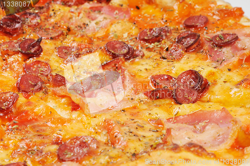 Image of Pizza with  sausage  and bacon, background