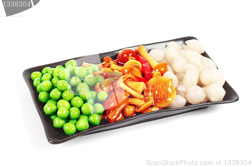 Image of A plate of pickles. Peas, mushrooms and onions