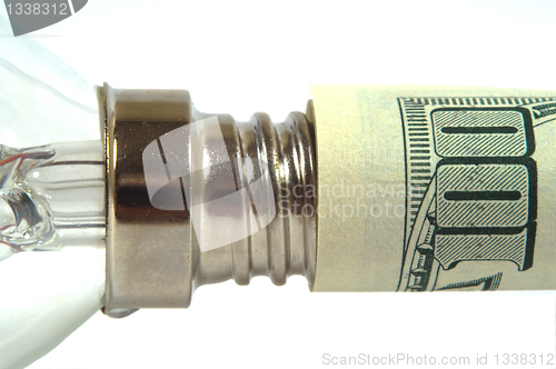 Image of The lamp is inserted into the dollar