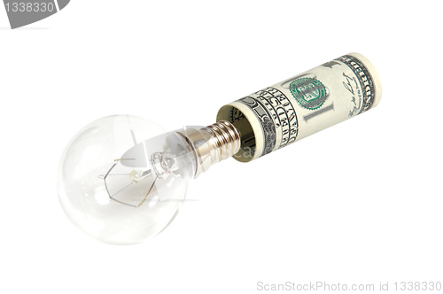 Image of The lamp is inserted into the dollar