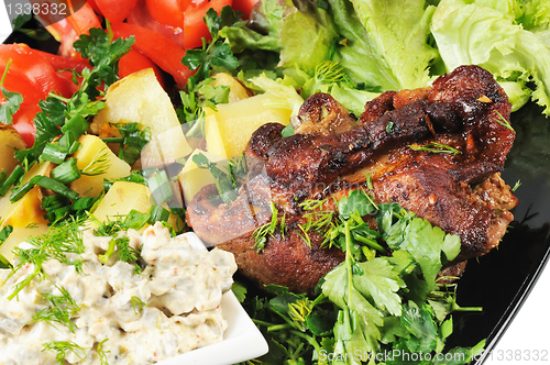 Image of Grilled meat and potatoes