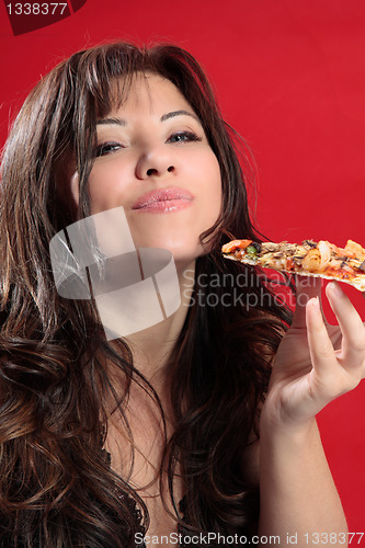 Image of Mmmm woman enjoying pizza