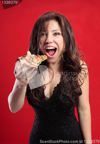 Image of Female eating pizza