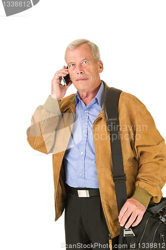 Image of Senior taking on his smartphone
