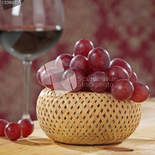 Image of red grapes and wine