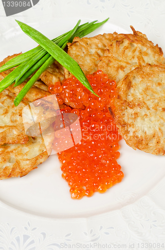 Image of pancakes with red caviar