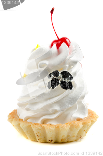 Image of cupcake with cherry and silver ring