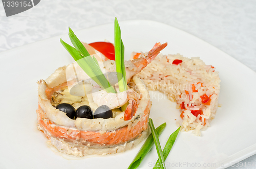 Image of fish with rice and vegetables