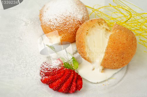Image of Dessert of ice-cream at biscuit