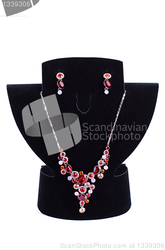 Image of necklace with pendants and earrings