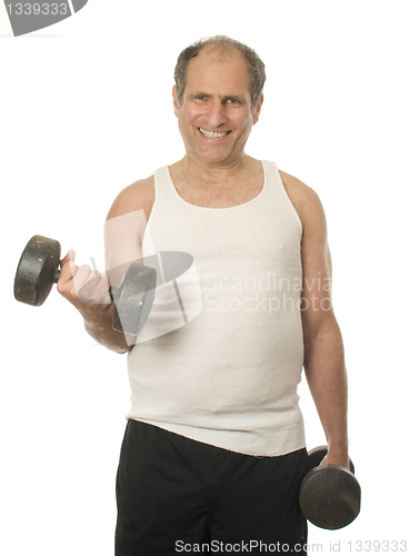 Image of middle age senior man working out with dumbbell weights