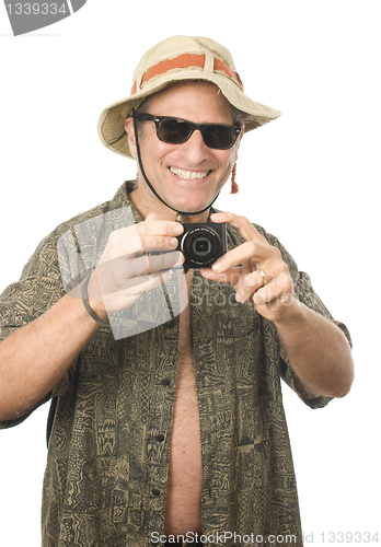 Image of middle age senior tourist male digital camera