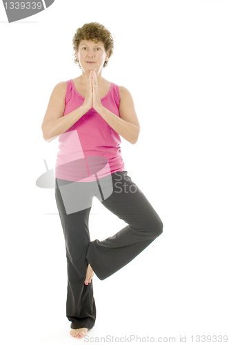 Image of middle age senior woman fitness yoga pose