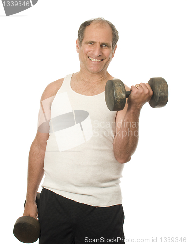 Image of middle age senior man working out with dumbbell weights