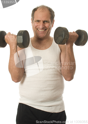 Image of middle age senior man working out with dumbbell weights