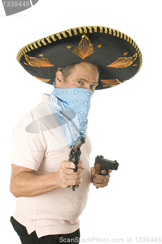 Image of middle age senior tourist male wearing Mexican somebrero hat cow