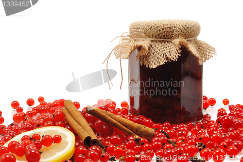 Image of Jar of homemade red currant jam with fresh fruits