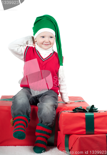 Image of Christmas toddler with presents
