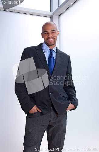 Image of Good-looking smiling businessman