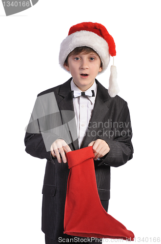 Image of Boy with red hat and red sock, isolated