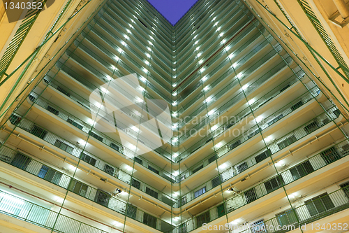 Image of apartment building block at night