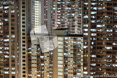 Image of apartment building at night