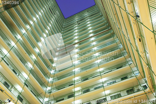 Image of apartment building block at night