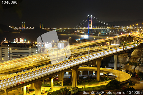 Image of reeway and bridge at night