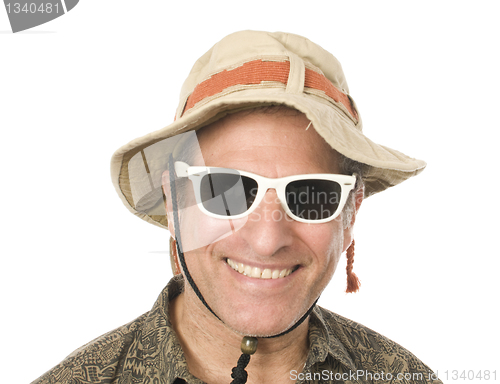Image of senior tourist wearing funny hat sunglasses