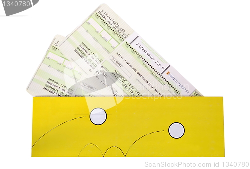 Image of Airtickets to yellow envelope on white background